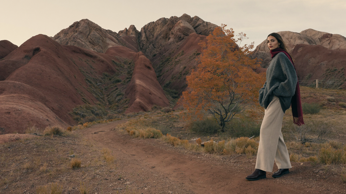 Woman in charcoal cashmere at red rocks, Colorado